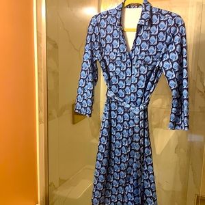 J McLaughlin Brynn dress with peacock pattern.
